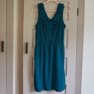 Teal strapless dress.